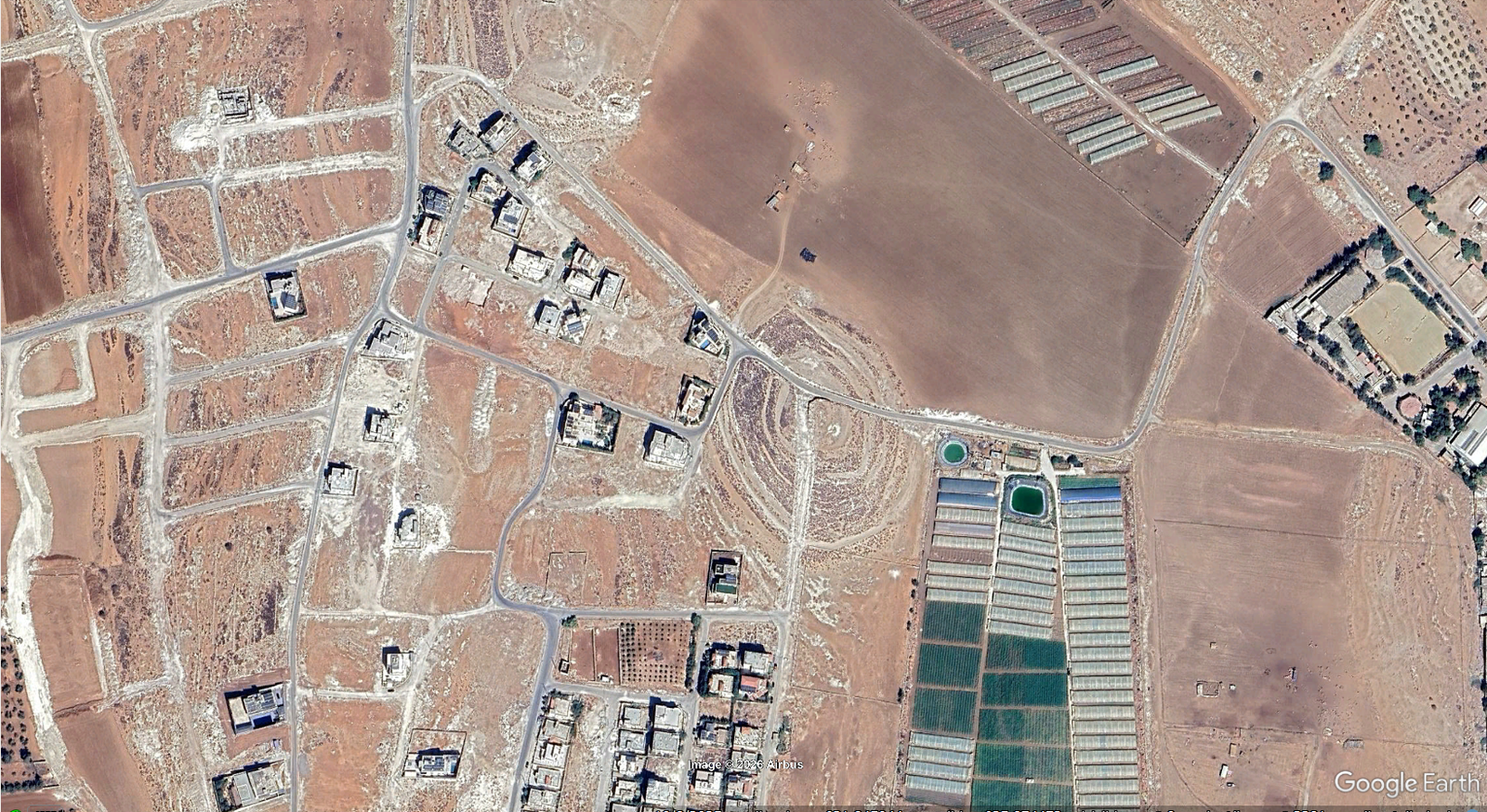 قطعة ارض سكنيه 513 متر ام البساتين / اسكان الكونية / بالقرب من مدرسة ام العساكر الاساسية المختلطة